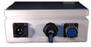 Close-up of a white box with knobs and switchesDescription automatically generated